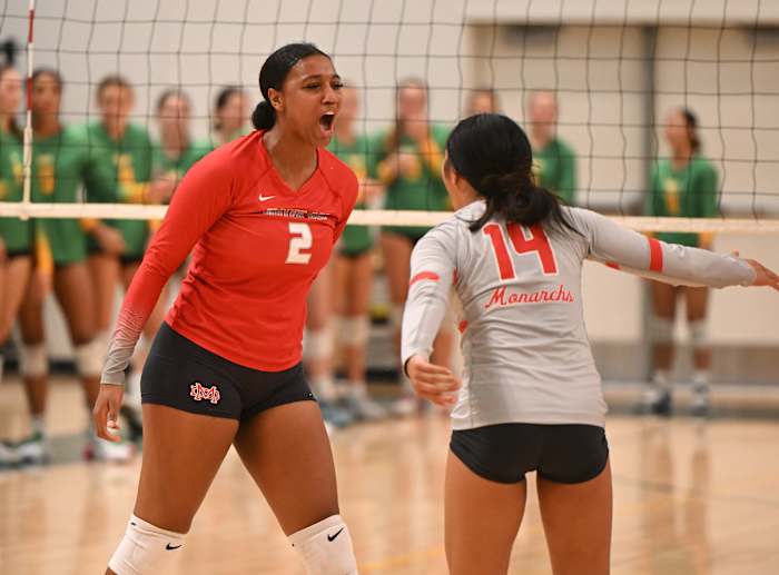 Isabel Clark (2) and Malyssa Cawa (14) with a moment